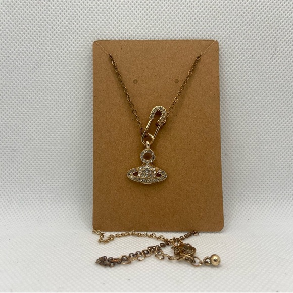 Gold and Silver Saturn Pendant Necklace - Picture 3 of 3
